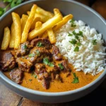 Coconut-Infused Beef Curry with Fries and Rice